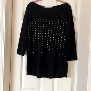 Black silver and gold studded sweater.